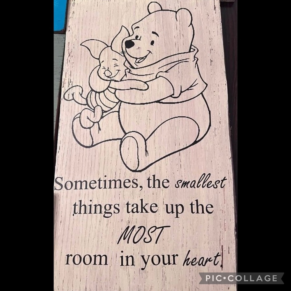 Wooden painted sign with vinyl lettering: Winnie the Pooh quote
